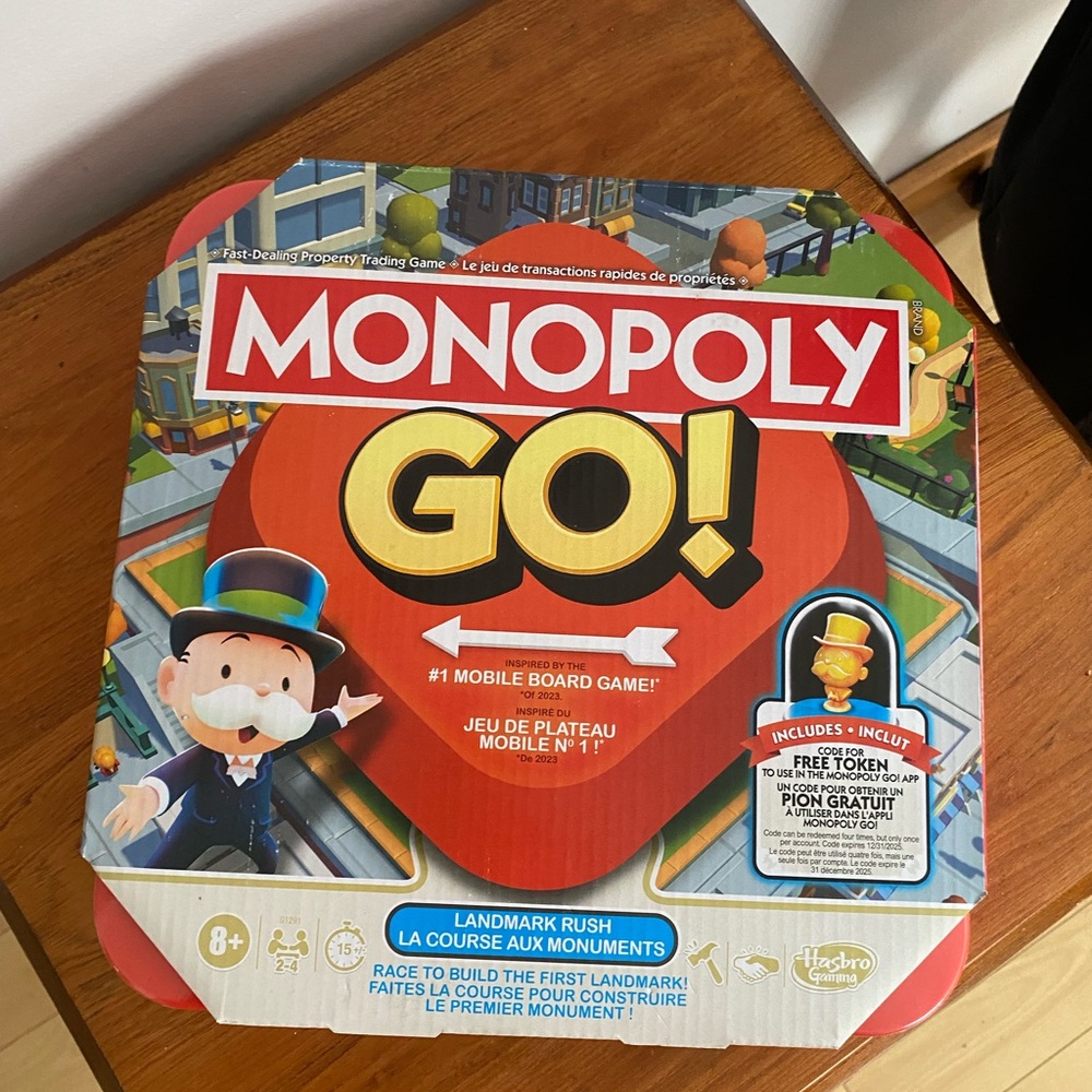 Hasbro Monopoly GO! Board Game - Red, Yellow, Blue, White